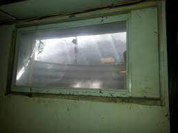 Wood storm and screen window with fixed glass in the upper pane and interchangeable aluminum framed glass storm and screen panels. Do I Use A Wooden Frame For A Basement Hopper Window Home Improvement Stack Exchange