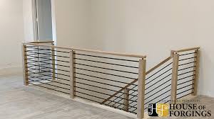 This keeps people from trying to climb up the horizontal balusters to go over the deck railing. Horizontal Railing Affordable Modern Staircases