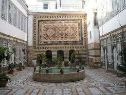 The Intricate Stonework Wall You See In The Traditional Arab Courtyard Home Bayt Arabi Known As Bayt Al Islamic Architecture Architecture Courtyard House