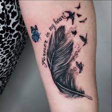 The eagle feather tattoo is a symbol of courage and resilience. Beautiful Looking Feather Tattoo Designs With Their Meaning Body Tattoo Art