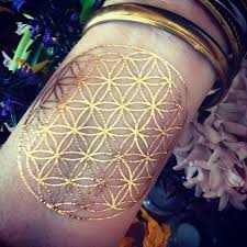 The meaning of cat tattoos can vary depending on the specific person's intentions. Permanent Gold Tattoos Gold Tattoo Ink Gold Tattoo Gold Henna