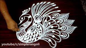 In the kolam patterns, many designs are derived from magical motifs and abstract designs blended with philosophic and religious motifs which have been mingled together.motifs may latest kolam designs images. Creative Peacock Rangoli Design Patterns Easy Peacock Kolam Designs Margazhi Muggulu Designs Youtube