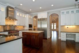 Love The Built In Desk Arched Doorways And Upper Cabinet Lighting Built In Desk Upper Cabinets Cabinet Lighting