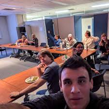 In the symposium, straight up drinking it. And by "it", let's justr say...  Spilled wine