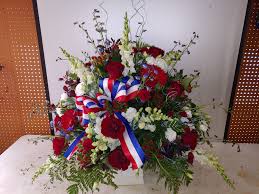 This highly personal type of arrangement is appropriate for a spouse or a member of the immediate family to send to the service, or for parents to send for a child. Red White And Blue Sympathy Arrangement In Cincinnati Oh Osterbrock Florist