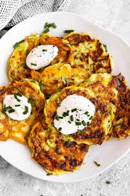Next, mix it with egg, flour, seasoning and herbs. Easy Zucchini Fritters Recipe Savory Nothings