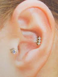 Celebs like victoria beckham, zoe kravitz, lia marie johnson and emma watson have worn this piercing in their day to day life. 14k Solid Gold Inner Conch Piercing Triple Prubg Set Cz Es Etsy