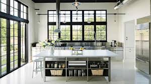 This kitchen simple but elegant kitchen features a handful of industrial finishes, from the exposed pipework and chrome extractor fan, to the exposed brick wall and pendant lights. 28 Striking Industrial Kitchen Design Ideas Photo Gallery Home Awakening