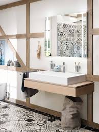 This bathroom, designed by alan hilsabeck, jr., features walnut cabinets, shoji screen doors with metal tile and faux grass cloth walls. Design An Oriental Bathroom With Abstract Tile Patterns Hansgrohe Int