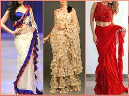Glam Up Yourself Like Bollywood Divas In The Hot New Ruffled Saree Fashion Industry Network Beige and brown, orange color saree in lycra fabric with floral, printed, stone work. fashion industry network