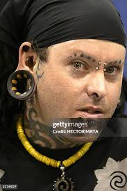 John Durante, a body artist based in Phoenix, Arizona, displays his... News  Photo