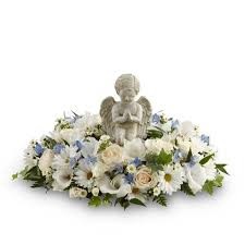 But then it all depends on who the deceased is to you and the kind of relationship that existed between both of you. Angel Funeral Flowers At Send Flowers Funeral Flower Arrangements Funeral Floral Funeral Flowers