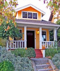 Best Exterior Paint Colors For Small Houses Brilliant Decoration Orange Exte Small Cottage Homes Exterior House Paint Color Combinations Cottage House Exterior