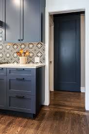 We designed this sliding barn door project for our kitchen, as part of a fairly full on renovation that involved transforming our formal dining room into a mud room and a new pantry. Navy Barn Door To Laundry Matches Kitchen Cabinet Color Transitional Kitchen Sacramento By Mak Design Build Inc Houzz
