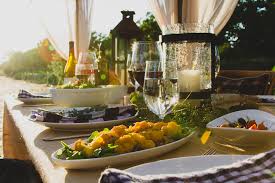 Sitting at a long table and breaking bread can be a way to showcase your farm, small business, or other creative industry. Five Tips For Hosting A Farm To Table Dinner