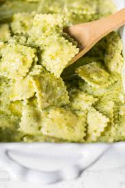 Baked Ravioli With Pesto Cream Sauce Recipe Creamy Pesto Sauce Creamy Pesto Pasta Pesto Dishes