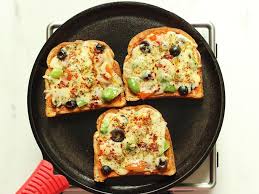 It is a perfect evening snack which can be. Bread Pizza Recipe How To Make Bread Pizza Swasthi S Recipes