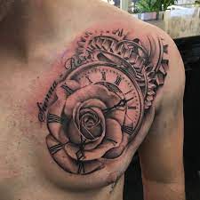 Rose chest tattoo designs, ideas and meaning | tattoos for you #tattoo #chesttattoos #tattoos. Clock Rose Time Chest Tattoo Cool Chest Tattoos Chest Tattoo Men Rose Chest Tattoo