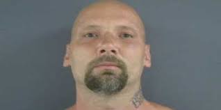 Allegedly stabbed victim in the head