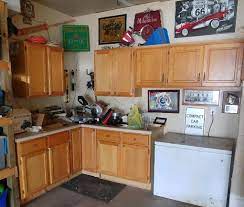 Speaking of mounted garage cabinets, did you know that standard kitchen cabinets can work perfectly in the garage? What To Do With Old Kitchen Cabinets