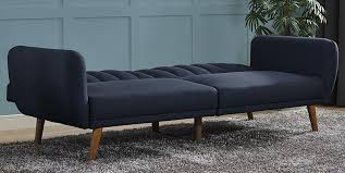 Couch definition, a piece of furniture for seating from two to four people, typically in the form of a bench with a back, sometimes having an armrest at one or each end, and partly or wholly upholstered and often fitted with springs, tailored cushions, skirts, etc.; How To Turn A Futon Into A Bed Inn Of Silent Music