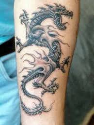 Fierce, strong, and mysterious, these creatures are found in the myths and legends of a dragon tattoo also looks great small or large. Pin By Fabian Watts On Tatoos Dragon Tattoo Arm Dragon Tattoo For Women Dragon Tattoos For Men