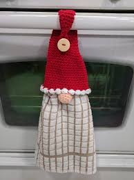 They're also made with a rubber band so any towel will fit. Crochet Gnome Towel Topper Free Pattern Holiday Crochet Christmas Crochet Patterns Christmas Crafts