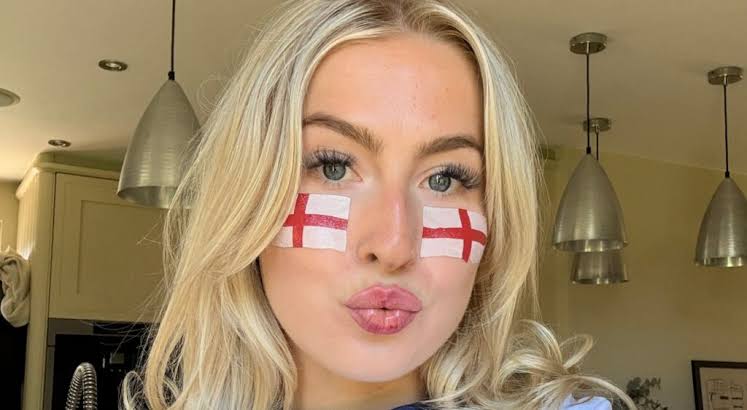 England Fan Flashes The Crowd During World Cup Celebration