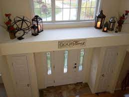 50 Ideas To Decorate Your Space With Candles For Christmas Godiygo Com Ledge Decor Window Ledge Decor Foyer Decorating