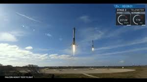 Watch spacex make history with rocket landing on drone ship. Spacex Stuns With Two Simultaneous Rocket Landings Musk S Tesla Heads To Mars