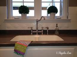 A kitchen that works llc. Painted Ceramic Tile Backsplash In My Kitchen A Year Later 11 Magnolia Lane
