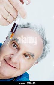 Close up of a hypodermic syringe and needle. Logos removed Stock Photo