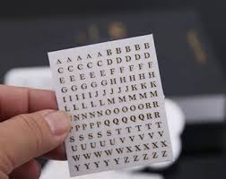 With today's desktop publishing programs and the quality of printers and papers, you can create small quantities of customized stickers. Alphabet Stickers Etsy