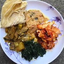 On One Plate Jackfruit Cari Egg Rougaille Tomato Creole Sauce Spinach Creamy Dhal And Dhal Puri Kuchendekoration