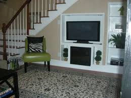Enhance stone stairs with plants and grasses to create a more natural feel. Television Under Stairs Design Ideas Pictures Remodel And Decor Stairs Design Interior Design Under Stairs Stairs In Living Room
