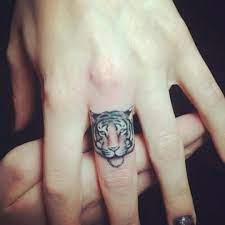 10 Tameable Tiger Tattoos Basic Tattoos Hand Tattoos For Women Small Finger Tattoos
