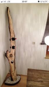Weinregal Aus Holz In 2020 Weinregal Baumstamm Regal