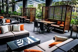 Browse a wide variety of outdoor dining furniture, including bistro sets and individual outdoor dining table and chair designs in dozens of durable materials. Casual Outdoor Dining Restaurant With Cushions Stock Photo Picture And Royalty Free Image Image 33028086