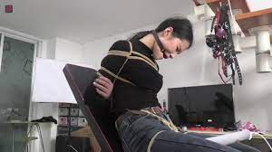 Asian Girl In Jeans And Bondage - VJAV.com
