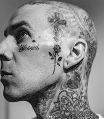 Yelawolf, clipse, waka flocka, kid cudi, too short, big sean, xzibit, game, rick ross, lil wayne, talib kweli, asher roth, warren g, wiz khalifa, young dro, royce da 5 9, killa. Travis Barker S New Face Tattoo Tattoos Rose Tattoo Face Tattoo