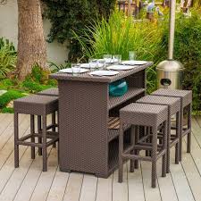 A nice patio table accompanied by a few sturdy chairs can be essential for decorating the outdoor room. Silverton 7 Piece Outdoor Dining Set Outdoor Bar Sets Outdoor Dining Set Patio Bar Set