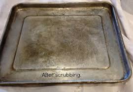 Your first move is to pour baking soda into your cup of warm water to form a thick paste. Get Baked On Grease Off Of Aluminum Housewife How Tos