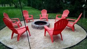 Fire Pit With Pea Gravel And Lowes Adirondack Chairs I Added Tiki Torches Around The Outside Fire Pit And Adirondack Chairs Gravel Patio Fire Pit Materials