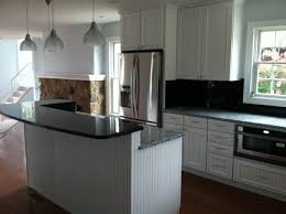 white painted maple kitchen cabinetry