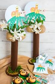 We offer perfectly matching, themed baby shower supplies and baby shower decorations, novelty baby shower favors to complement the theme, and plenty of keepsakes, balloons, and candy favors to celebrate any sort of baby shower, traditional or otherwise. Diy Jungle Baby Shower Centerpieces 3 Boys And A Dog