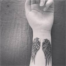 Mass effect paragon symbol wrist tattoo. Lizard Tattoos Geckos Or Iguanas Tattoo Ideas