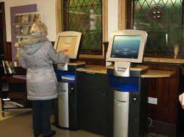 Self Service Kiosk At Small Library Customers Can Check In Material Or Check Out Material Pay Fines Or Access Their A Book Cart Library Design Self Service