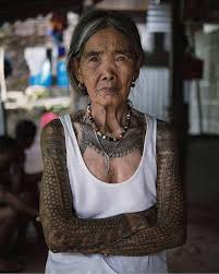 Like other indigenouism artists, her tattoo ink is composed of the indigenous materials, which are mixture of charcoal and water that will be tapped into the skin through a thorn end of a calamansi or pomelo tree. Whang Od Oggay The 103 Year Old Filipino Tattoo Artist Interestingasfuck