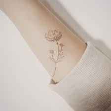 Resultat De Recherche D Images Pour Cosmos Flower Tattoo Brown Tattoo Ink Elbow Tattoos Cosmos Tattoo