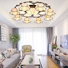 Too many solid colors in a blue and grey living room can make it look too dull and, even worse, boring. Nature Inspired Blue Yellow Flower Shade Flush Mount Ceiling Light With Center Bowl For Living Room Beautifulhalo Com